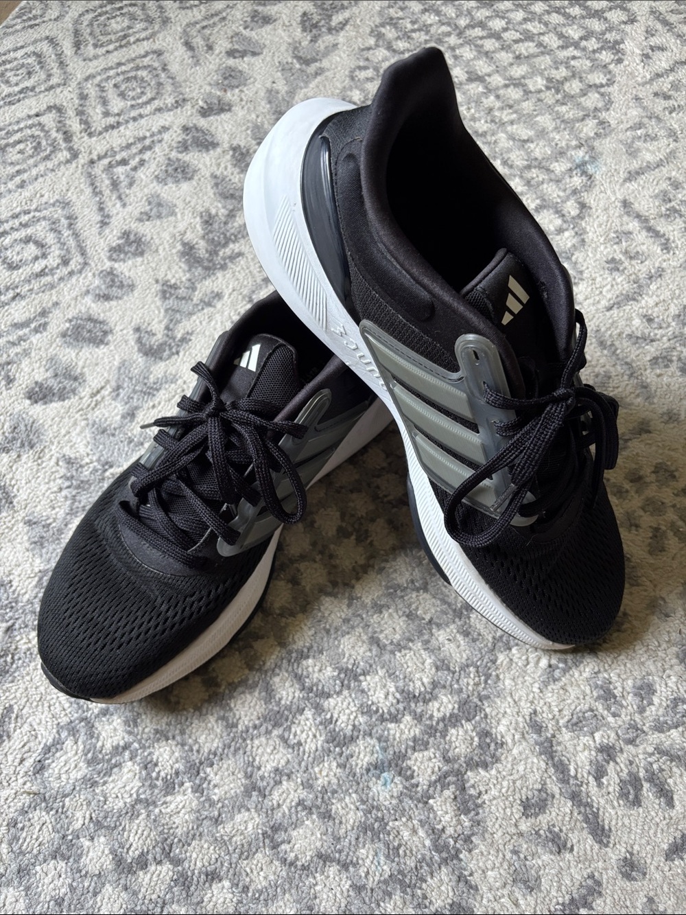 adidas Men’s Ultrabounce Black Running Shoes with White Soles and Gray Stripes